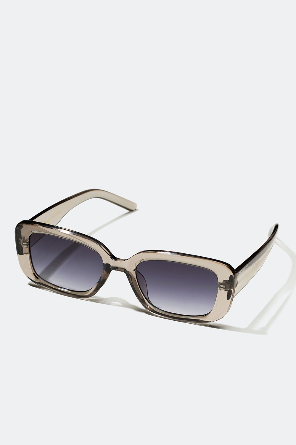 Rektangulære solbriller med gennemsigtigt lysegråt stel i gruppen Accessories / Solbriller hos Glitter (176000909500)