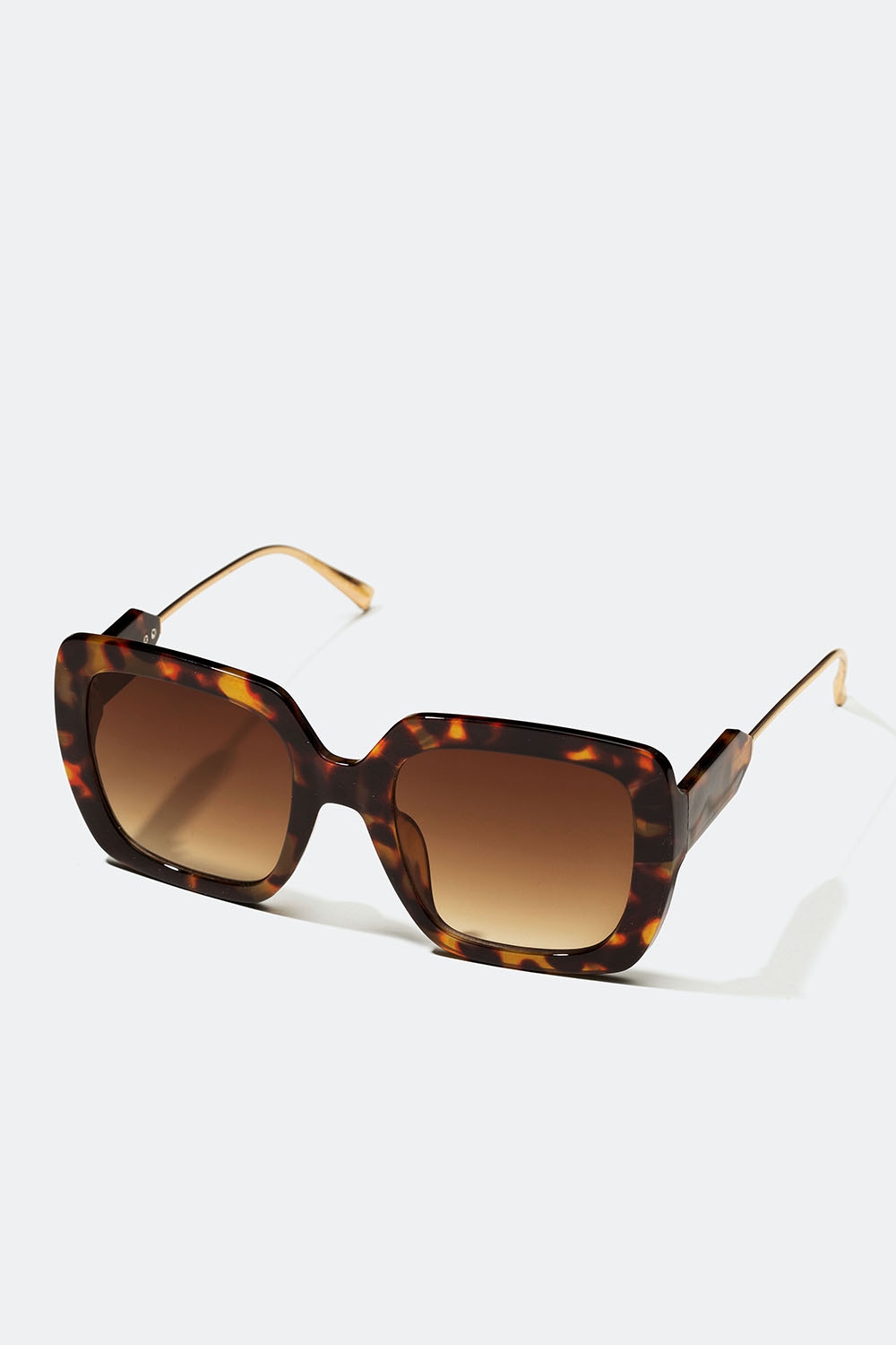 Brune oversize solbriller med guldfarvede stænger i gruppen Accessories / Solbriller hos Glitter (176001158400)