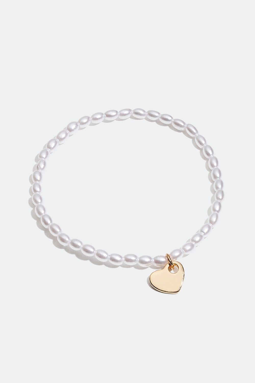 Armbånd med hvide perler og hjerte i gruppen Smykker / Armbånd / Tynde hos Glitter (251000973001)