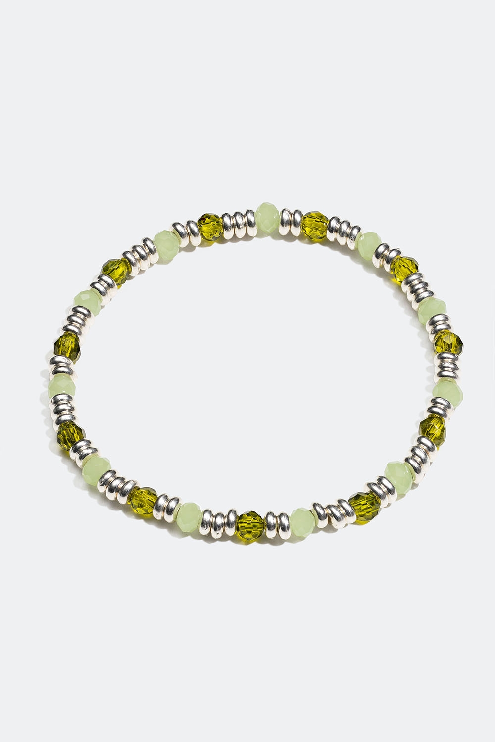 Elastisk armbånd med sølvfarvede og grønne perler i gruppen Smykker / Armbånd / Tynde hos Glitter (251001097801)