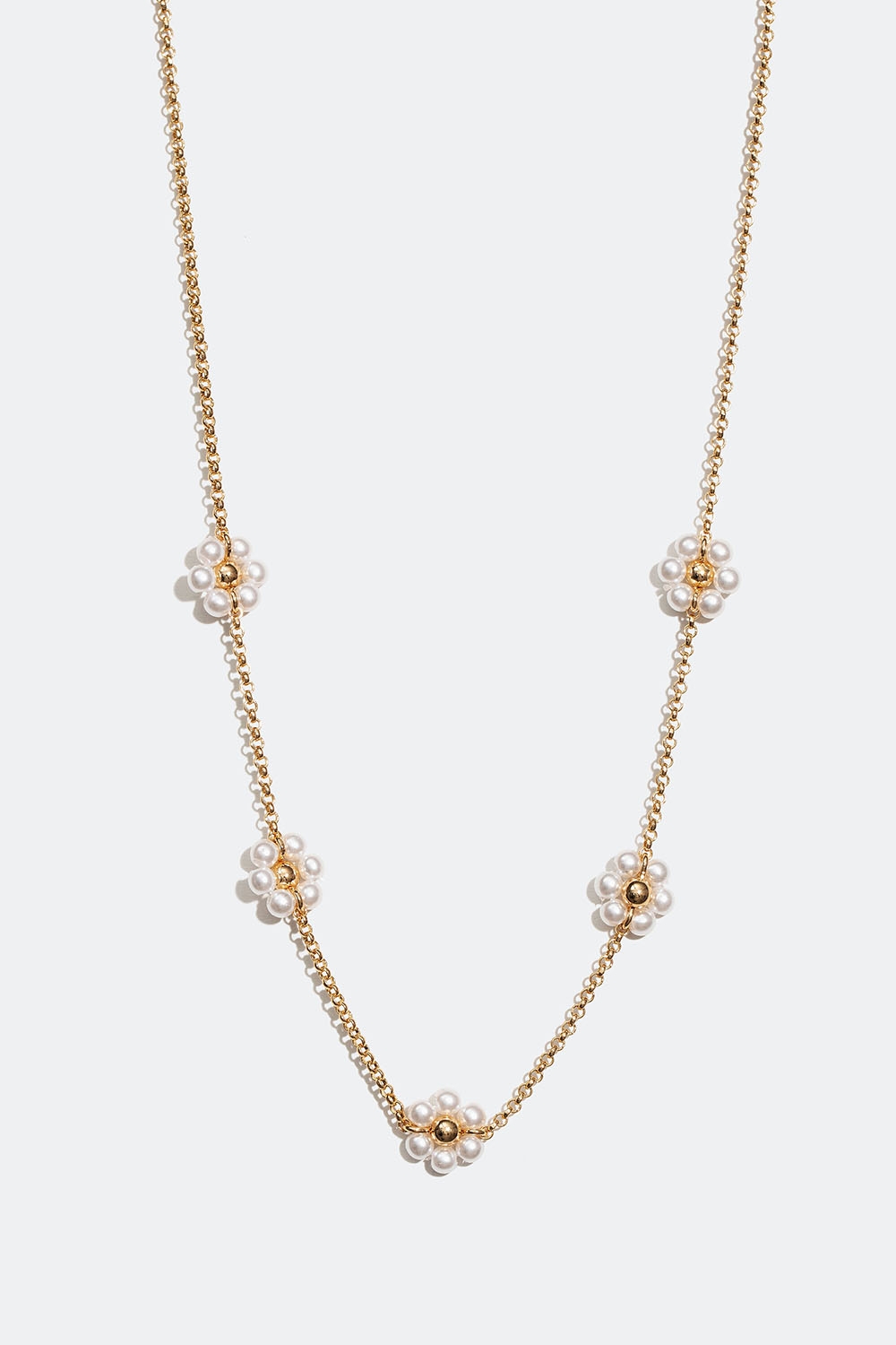 Guldfarvet halskæde med hvide blomster i gruppen Smykker / Halskæder / Halskæder med vedhæng hos Glitter (254001442002)